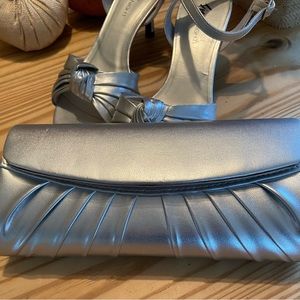 DRESSY SILVER CLUTCH